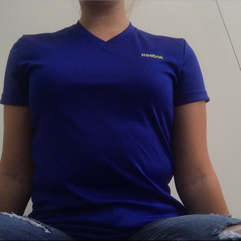 Rebok blue tee,never been worn,in great condition!